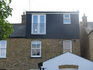 Loft conversions with dormer cladded with weather board